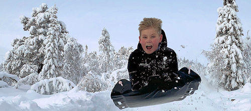 Boy sledding